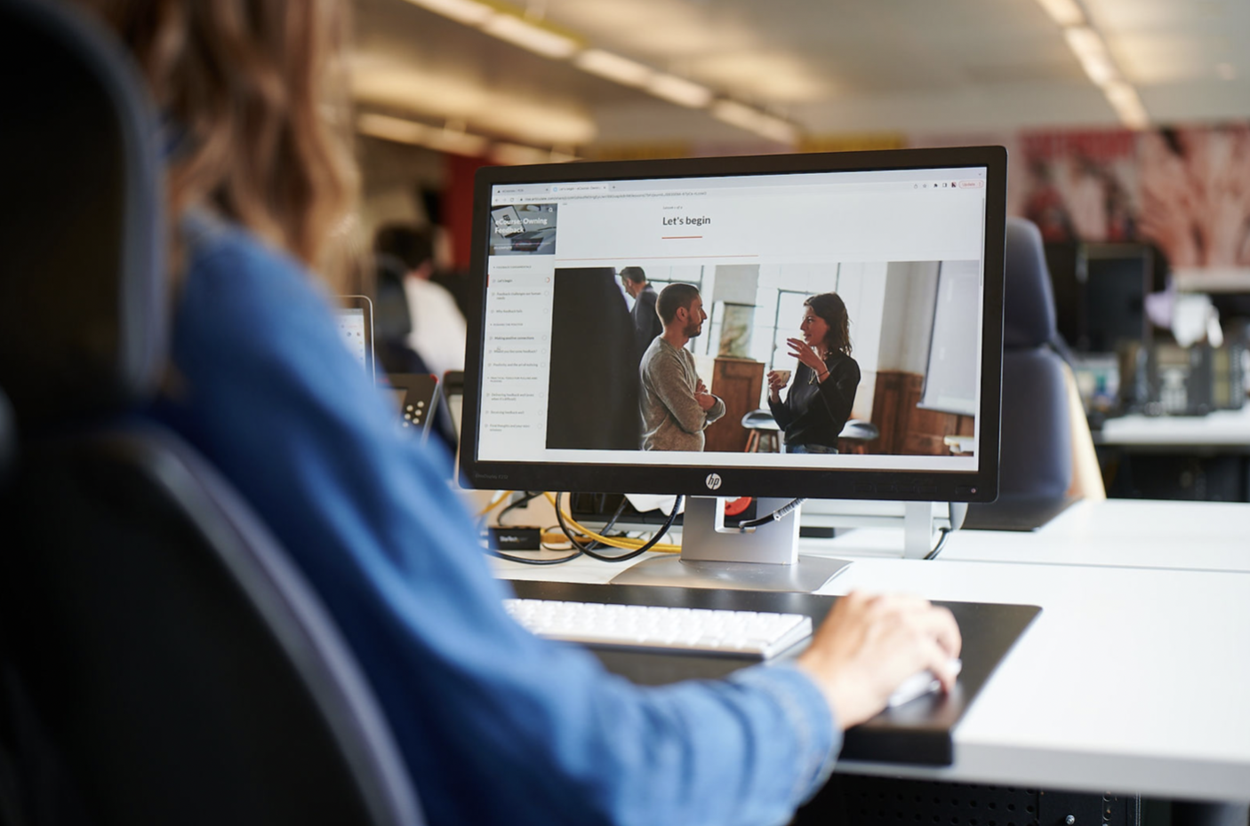 A learner exploring a module on screen