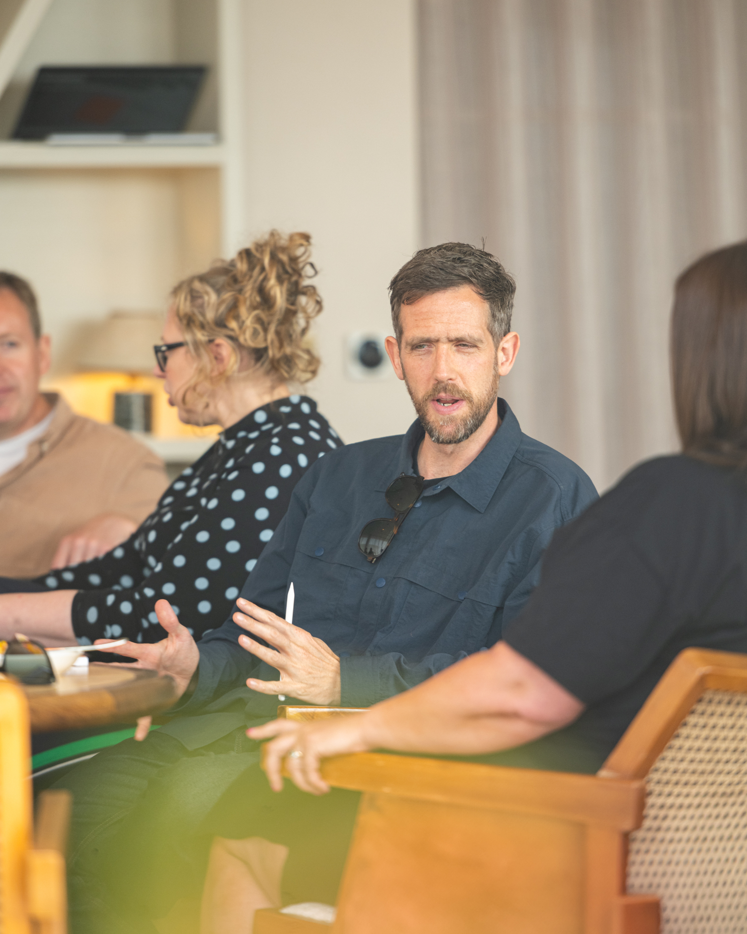 A facilitator in conversation during a group session
