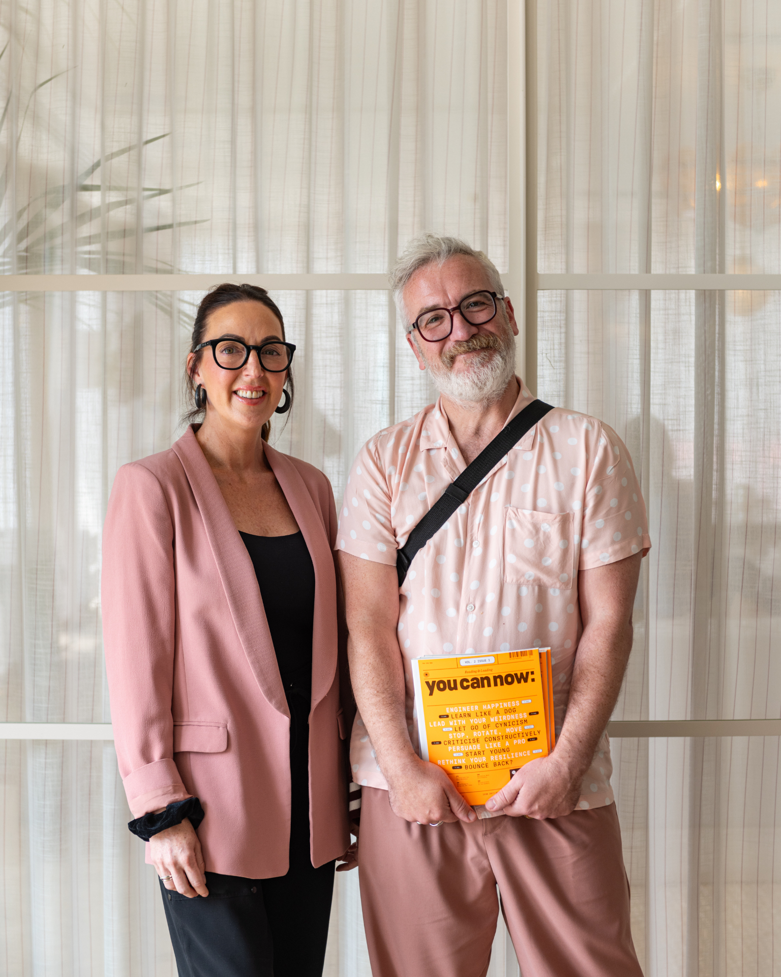 Two People & Culture leaders holding a You Can Now magazine