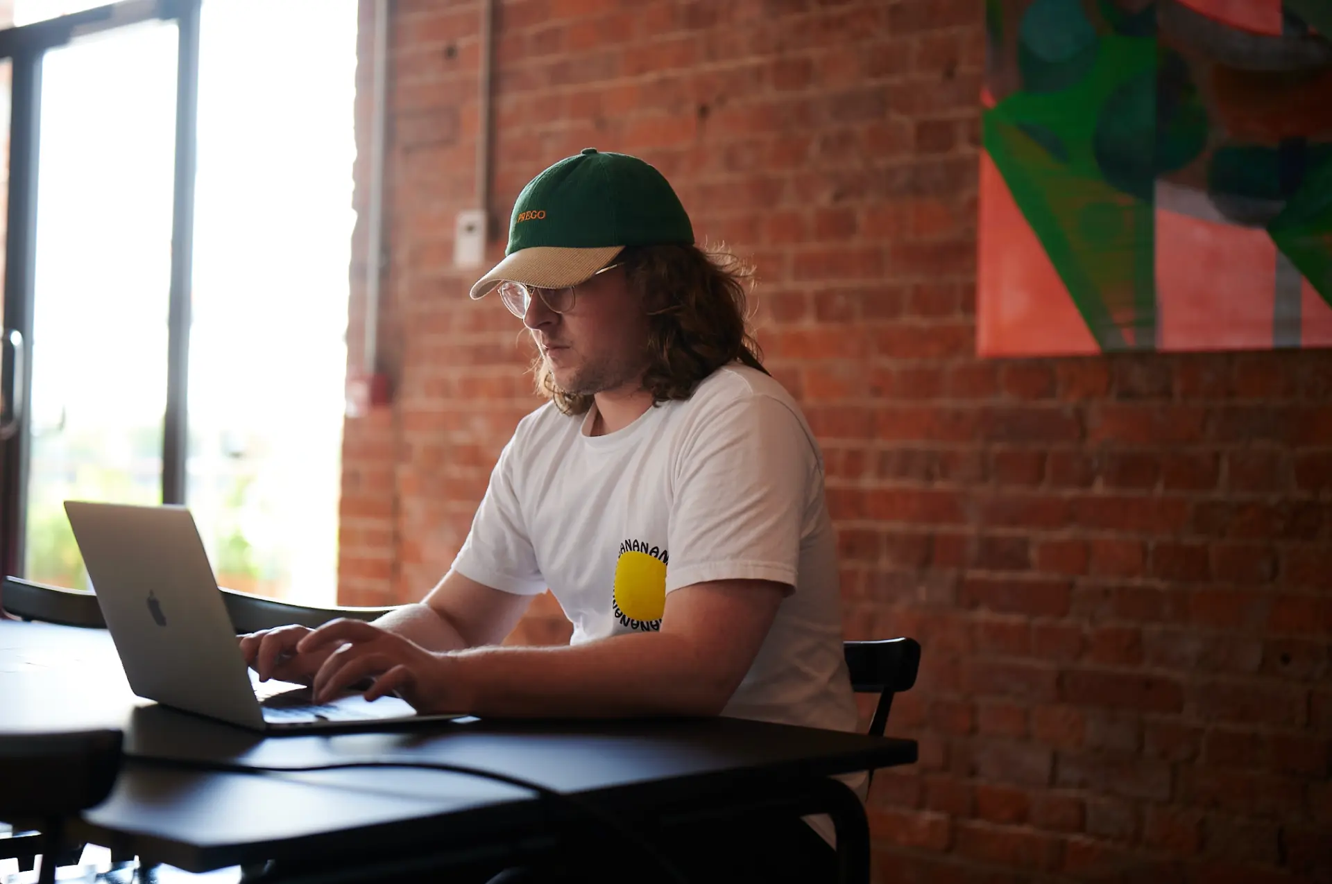 A manager working through the platform on a laptop