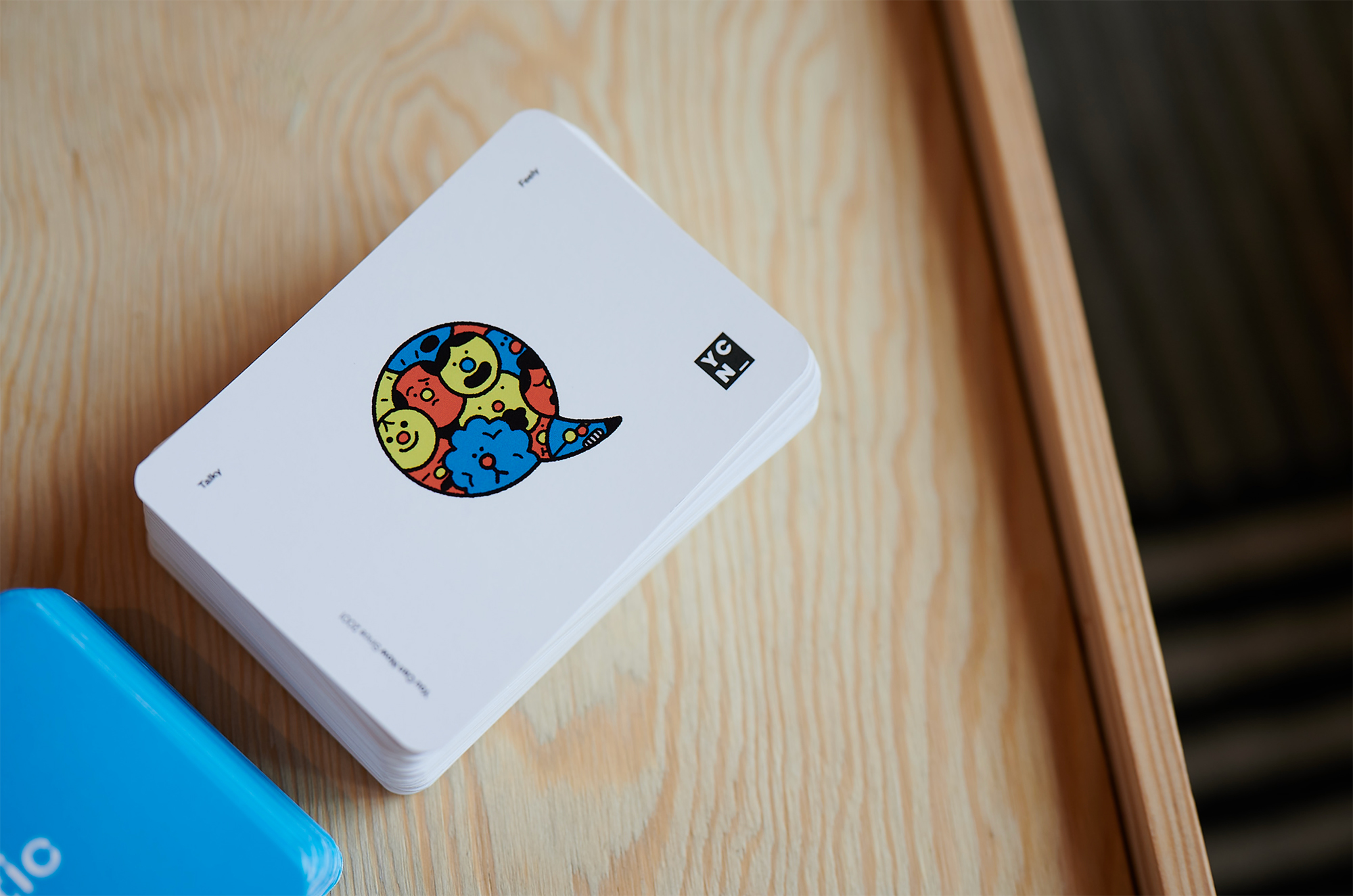 YCN Talky Feely conversation cards on a wooden surface