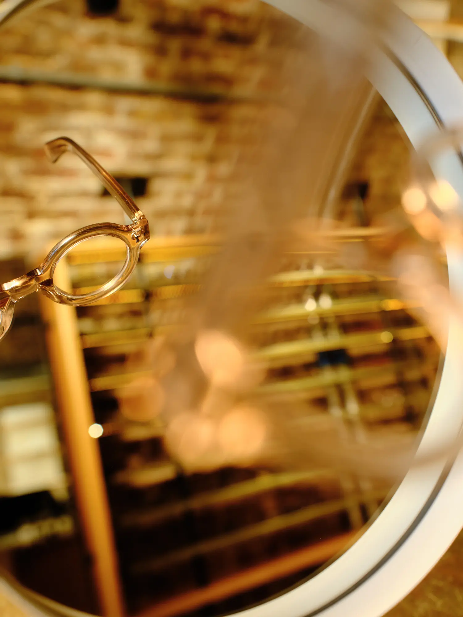 A close-up through a Cubitts frame of a warmly-lit store interior
