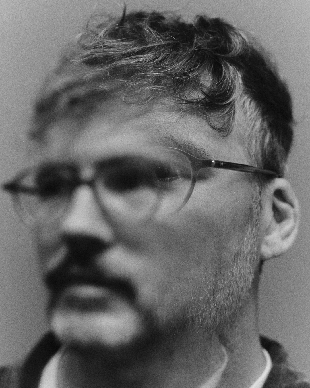 Tom Broughton, founder of Cubitts, portrait in glasses